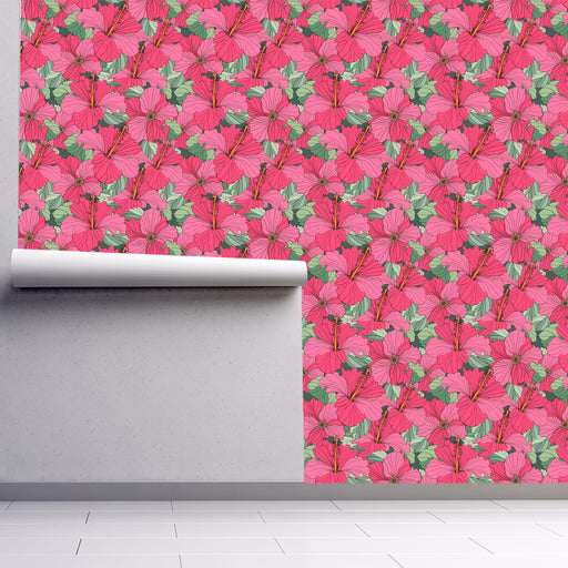 Pink Tropical Blooms wallpaper with pink hibiscus flowers on green background, Custom Wallpaper Design